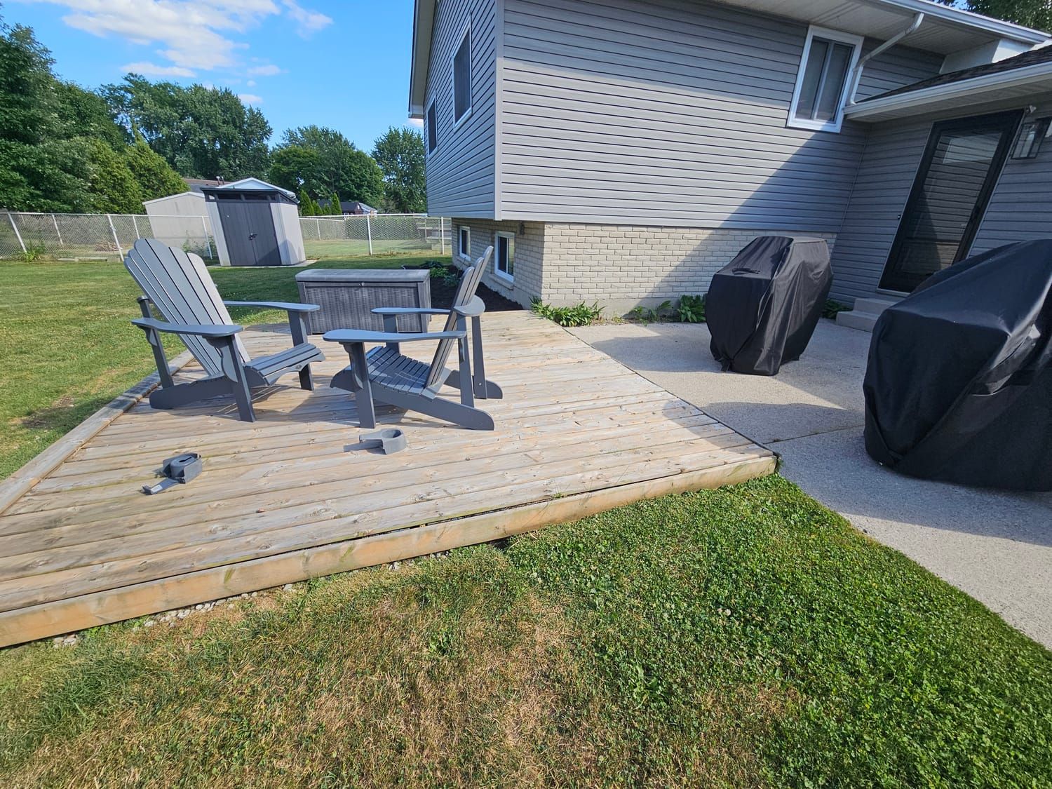 A tidied patio and deck seating area